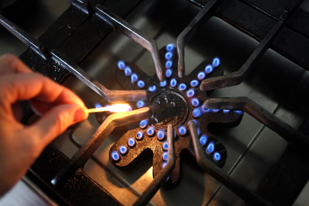 Factura de gas natural con gráfico de evolución de precios